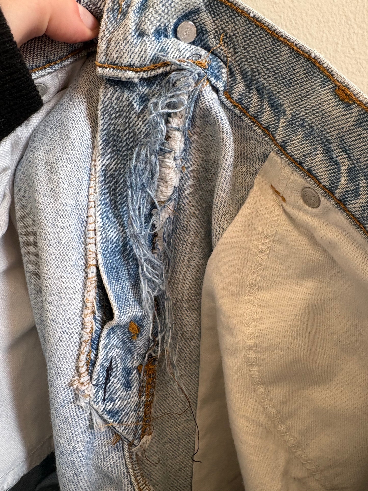 Vintage 1990s Levi's 550 Orange Tab Distressed Light Wash Denim Jeans