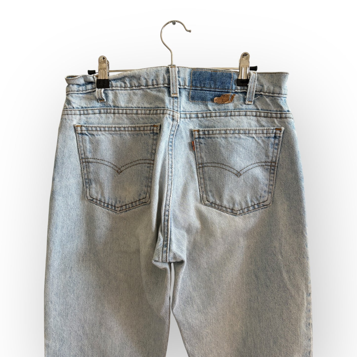 Vintage 1990s Levi's 550 Orange Tab Distressed Light Wash Denim Jeans